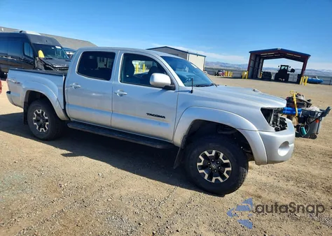 2009 Toyota Tacoma V6 из США, поврежденный, VIN 3TMLU42N79M030463
